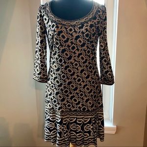 Whbm dress has gold metallic & embellishments.